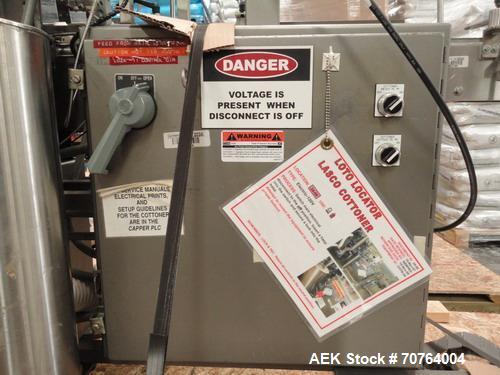 Used Lakso Model 71 Automatic Twin Head Cottoner capable of speeds up to 200 bottles per minute. Has 28" x 3-1/4" screw infeed. Can use natural or synthetic cotton up to 26 grams in inverted "U" conf...