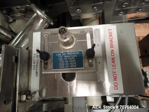 Used Lakso Model 71 Automatic Twin Head Cottoner capable of speeds up to 200 bottles per minute. Has 28" x 3-1/4" screw infeed. Can use natural or synthetic cotton up to 26 grams in inverted "U" conf...