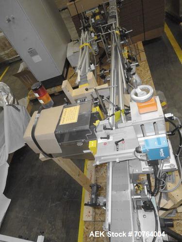 Used Lakso Model 71 Automatic Twin Head Cottoner capable of speeds up to 200 bottles per minute. Has 28" x 3-1/4" screw infeed. Can use natural or synthetic cotton up to 26 grams in inverted "U" conf...