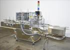 Used Lakso (IMA) Automatic Twin Head Cottoner, Model 300.