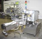 Used Lakso (IMA) Automatic Twin Head Cottoner, Model 300.