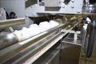 Used Lakso (IMA) Automatic Twin Head Cottoner, Model 300.