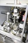 Used Lakso (IMA) Automatic Twin Head Cottoner, Model 300.
