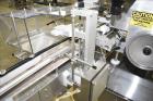 Used Lakso (IMA) Automatic Twin Head Cottoner, Model 300.