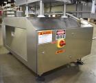 Used Lakso (IMA) Automatic Twin Head Cottoner, Model 300.