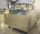 Used Lakso (IMA) Automatic Twin Head Cottoner, Model 300.