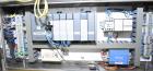 Used Lakso (IMA) Automatic Twin Head Cottoner, Model 300.