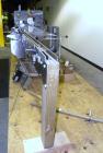Used Lakso Cottoner 300. Fully automatic twin head cotton inserter capable of speeds up to 300 containers per minute with a maximum cotton weight range of 26 grams per yard and a cut length range of ...