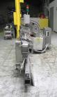 Used Lakso 450 Dual Station Inverted 'U' Cottoner. Machine has (2) cottoning heads for speeds up to 300 bottled per minute (depending on bottle size). Has a worm screw timing/alignment system. Comple...