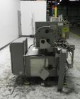 Used Lakso 450 Dual Station Inverted 'U' Cottoner. Machine has (2) cottoning heads for speeds up to 300 bottled per minute (depending on bottle size). Has a worm screw timing/alignment system. Comple...