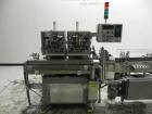 Used Lakso 450 Dual Station Inverted 'U' Cottoner. Machine has (2) cottoning heads for speeds up to 300 bottled per minute (depending on bottle size). Has a worm screw timing/alignment system. Comple...