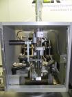 Used Lakso 450 Dual Station Inverted 'U' Cottoner. Machine has (2) cottoning heads for speeds up to 300 bottled per minute (depending on bottle size). Has a worm screw timing/alignment system. Comple...