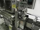Used Lakso 450 Dual Station Inverted 'U' Cottoner. Machine has (2) cottoning heads for speeds up to 300 bottled per minute (depending on bottle size). Has a worm screw timing/alignment system. Comple...