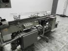 Used Lakso 450 Dual Station Inverted 'U' Cottoner. Machine has (2) cottoning heads for speeds up to 300 bottled per minute (depending on bottle size). Has a worm screw timing/alignment system. Comple...
