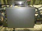 Used Lakso 450 Dual Station Inverted 'U' Cottoner. Machine has (2) cottoning heads for speeds up to 300 bottled per minute (depending on bottle size). Has a worm screw timing/alignment system. Comple...