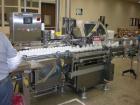 Used Lakso Model 71 Automatic Twin Head Cottoner capable of speeds up to 200 BPM. Has screw infeed automatic bottle. Has factory controls, 