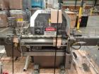 Used Lakso Model 71 Automatic Twin Head Cottoner capable of speeds up to 200 bottles per minute. Has 28