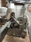 Used Lakso Model 71 Automatic Twin Head Cottoner capable of speeds up to 200 bottles per minute. Has 28