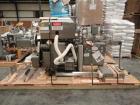 Used Lakso Model 71 Automatic Twin Head Cottoner capable of speeds up to 200 bottles per minute. Has 28