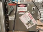 Used Lakso Model 71 Automatic Twin Head Cottoner capable of speeds up to 200 bottles per minute. Has 28