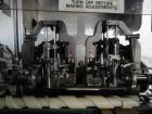 Used Lakso Model 71 Automatic Twin Head Cottoner capable of speeds up to 200 bottles per minute. Has 28
