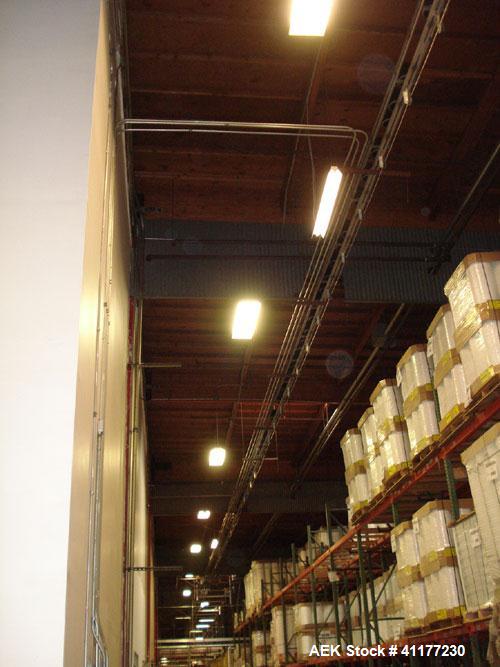Used I & H (Goldco) Low Level Bulk Depalletizer, Model 1002. Includes pallet stacker for 44" x 56" pallets. Includes 12' long stainless steel discharge table with plastic belting. Allen Bradley contr...