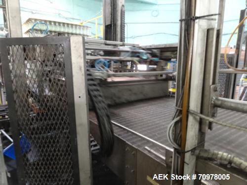 Used Priority One Low-level Bulk Depalletizer. Rated for glass or PET, 460 VAC 3 Phase 60 Hertz. Low-level container discharge, manual top-frame, stretch film and strap removal. Pallet stacker and sl...