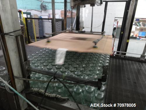 Used Priority One Low-level Bulk Depalletizer. Rated for glass or PET, 460 VAC 3 Phase 60 Hertz. Low-level container discharge, manual top-frame, stretch film and strap removal. Pallet stacker and sl...