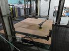 Used Priority One Low-level Bulk Depalletizer. Rated for glass or PET, 460 VAC 3 Phase 60 Hertz. Low-level container discharge, manual top-frame, stretch film and strap removal. Pallet stacker and sl...