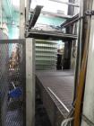 Used Priority One Low-level Bulk Depalletizer. Rated for glass or PET, 460 VAC 3 Phase 60 Hertz. Low-level container discharge, manual top-frame, stretch film and strap removal. Pallet stacker and sl...