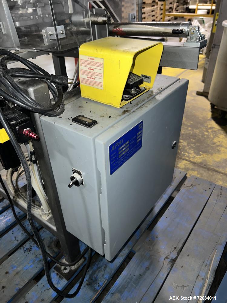 Used- Action Packaging Model Autocard ST2 Automatic Header Card Applicator. Speeds up to 25 cycles per minute, two cards per...