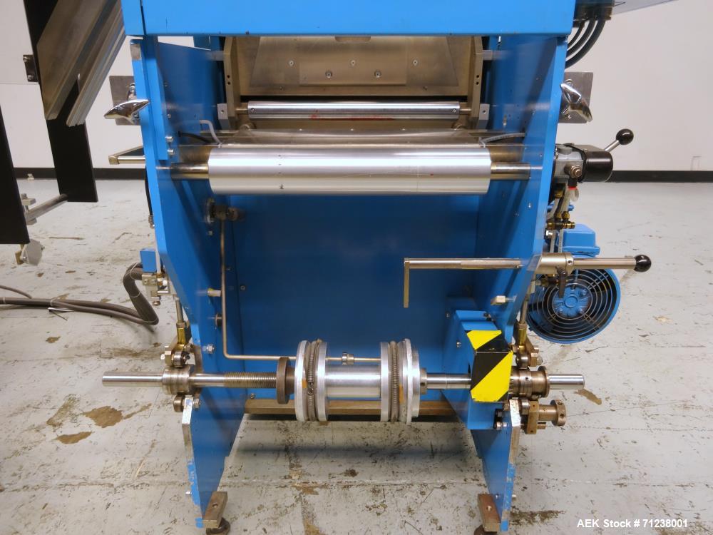 Used GUK Literature Feeder System, Type RS-42 / RS-21. Literature is roll fed, folded by the RS-42, cut and folded by the RS-21. Multiple folds possible.
