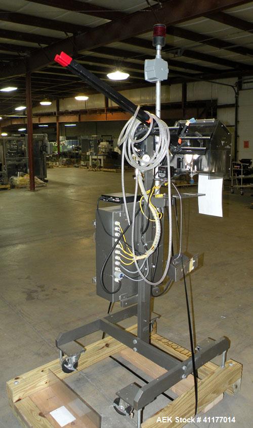 Used Minnesota Automation Reciprocating Coupon Feeder (topserter). Capable of speeds up to 90 units per minute. Has self contained Venturi style vacuum system, Allen Bradley SLC 500 Plc controls, and...