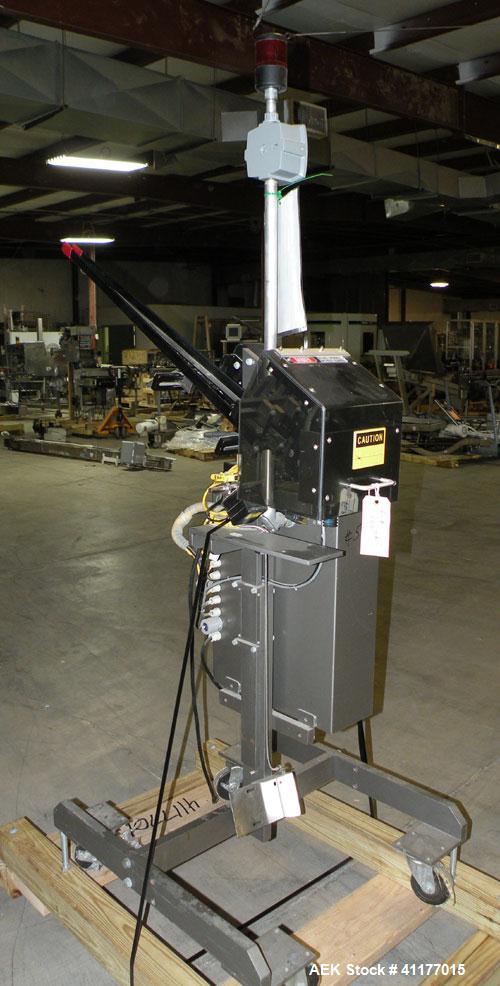 Used Minnesota Automation Reciprocating Coupon Feeder (topserter). Capable of speeds up to 90 units per minute. Has self contained Venturi style vacuum system, Allen Bradley SLC 500 PLC controls, and...