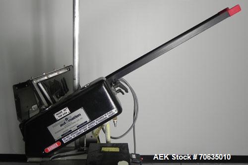 Used Minnesota Automation Model Special Reciprocating Coupon Feeder-Topserter. Capable of speeds up to 90 units per minute. Has self-contained Venturi style vacuum system. Has Allen Bradley SLC 500 P...
