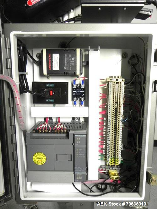 Used Minnesota Automation Model Special Reciprocating Coupon Feeder-Topserter. Capable of speeds up to 90 units per minute. Has self-contained Venturi style vacuum system. Has Allen Bradley SLC 500 P...