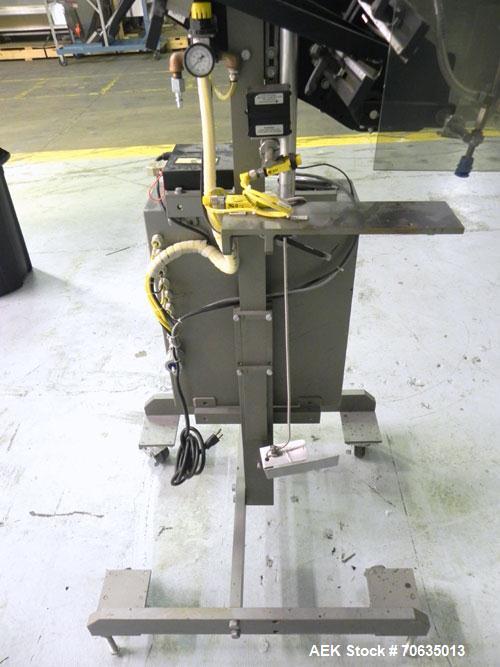 Used Minnesota Automation Model Special Reciprocating Coupon Feeder-Topserter. Capable of speeds up to 90 units per minute. Has self-contained Venturi style vacuum system. Has Allen Bradley SLC 500 P...