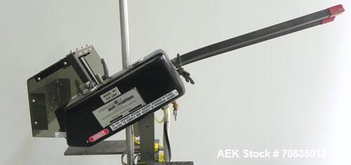 Used Minnesota Automation Model Special Reciprocating Coupon Feeder-Topserter. Capable of speeds up to 90 units per minute. Has self-contained Venturi style vacuum system. Has Allen Bradley SLC 500 P...