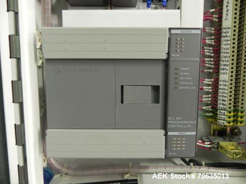 Used Minnesota Automation Model Special Reciprocating Coupon Feeder-Topserter. Capable of speeds up to 90 units per minute. Has self-contained Venturi style vacuum system. Has Allen Bradley SLC 500 P...