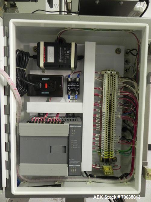 Used Minnesota Automation Model Special Reciprocating Coupon Feeder-Topserter. Capable of speeds up to 90 units per minute. Has self-contained Venturi style vacuum system. Has Allen Bradley SLC 500 P...
