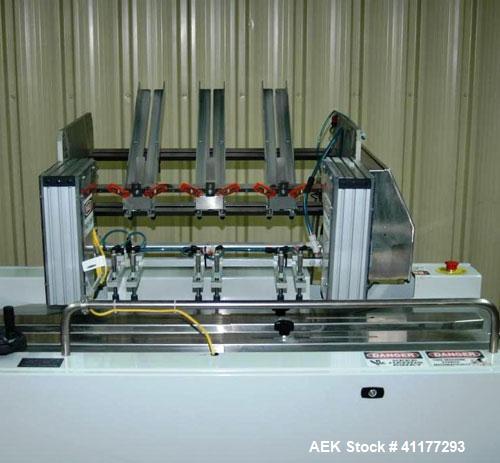 Used Streamfeeder Reciprocating Feeder, Model 8P-224. Has three lane coupon/tray denester magazine. Last used to fit product on infeed of Conflex shrink wrapper.