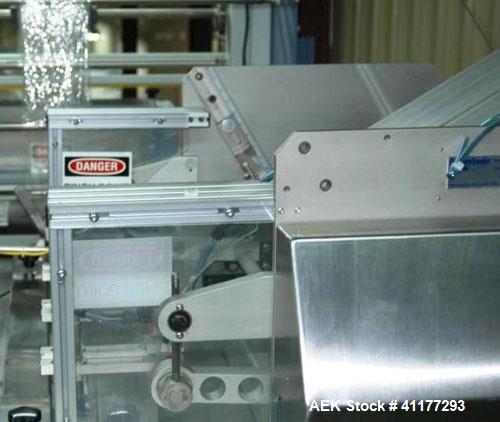 Used Streamfeeder Reciprocating Feeder, Model 8P-224. Has three lane coupon/tray denester magazine. Last used to fit product on infeed of Conflex shrink wrapper.