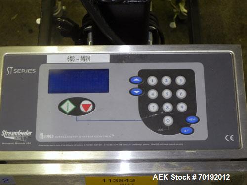 Used Streamfeeder Model ST850 Universal Friction Feeder. Machine capable of belt speeds up to 5500 inches per minute (140,000 mm per minute). Product size range: length 2.5" to 8.5" or 63.5mm to 215....