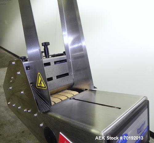 Used Streamfeeder Model ST850 Universal Friction Feeder. Machine capable of belt speeds up to 5500 inches per minute (140,000mm per minute). Product size range: length 2.5" to 8.5" or 63.5mm to 215.9...