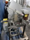 Used- Action Packaging Model Autocard ST2 Automatic Header Card Applicator. Speeds up to 25 cycles per minute, two cards per...