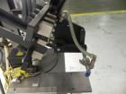 Used Minnesota Automation Model Special Reciprocating Coupon Feeder-Topserter. Capable of speeds up to 90 units per minute. Has self-contained Venturi style vacuum system. Has Allen Bradley SLC 500 P...