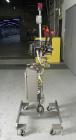 Used Minnesota Automation Model Special Reciprocating Coupon Feeder-Topserter. Capable of speeds up to 90 units per minute. Has self-contained Venturi style vacuum system. Has Allen Bradley SLC 500 P...