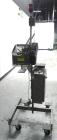 Used Minnesota Automation Model Special Reciprocating Coupon Feeder-Topserter. Capable of speeds up to 90 units per minute. Has self-contained Venturi style vacuum system. Has Allen Bradley SLC 500 P...