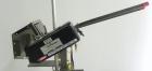Used Minnesota Automation Model Special Reciprocating Coupon Feeder-Topserter. Capable of speeds up to 90 units per minute. Has self-contained Venturi style vacuum system. Has Allen Bradley SLC 500 P...