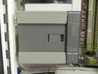 Used Minnesota Automation Model Special Reciprocating Coupon Feeder-Topserter. Capable of speeds up to 90 units per minute. Has self-contained Venturi style vacuum system. Has Allen Bradley SLC 500 P...